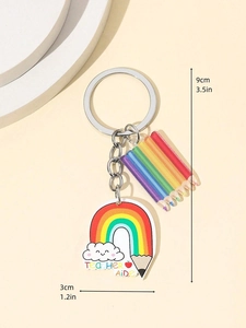 Detail of acrylic teacher keychain with rainbow pencil and Teacher Aide text charm