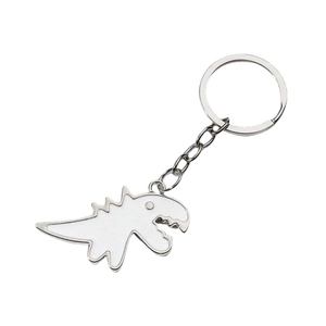 Simpatico portachiavi a forma di dinosauro in smalto bianco con catena in argento