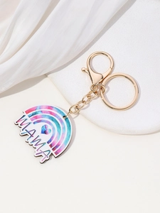 Detailed shot of golden clasp and colorful rainbow MAMA pendant with blue heart