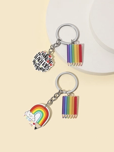 Detailed macro view of acrylic Teacher keychain with pencil and rainbow motifs
