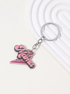 Detailed macro view of pink leopard print Mama lightning bolt acrylic keychain