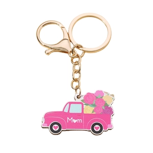 Porte-clés camion rose fête des mères avec fleurs et lettrage cœur Mom sur fond blanc