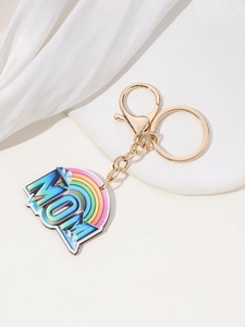 Close-up of rainbow MAMA acrylic keychain with gold lobster clasp for Mother's Day
