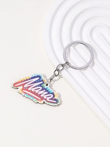 Detail showing colorful Mama keychain pendant with vibrant stripes and silver ring