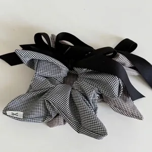 Elegant black and white checkered bow scrunchies set for women in Korean minimalist style
