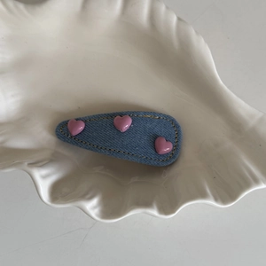 Blue denim heart BB hair clip with yellow stitching and pink heart resin charms