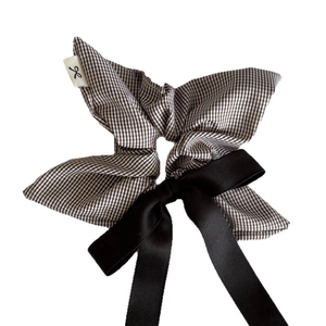Elegant retro gingham bow scrunchie with long black satin ribbons for women's hairstyle