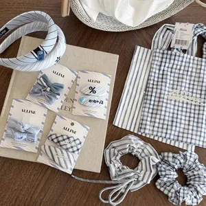 Blue and white striped hair accessory set with headband, scrunchies and bow clips