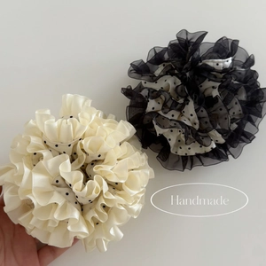 Polka dot scrunchie set featuring off-white satin and black organza ruffled hair ties