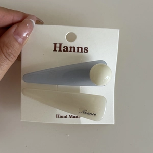 Handmade cream and dusty blue marble oval hair clip set with pearl beads on card
