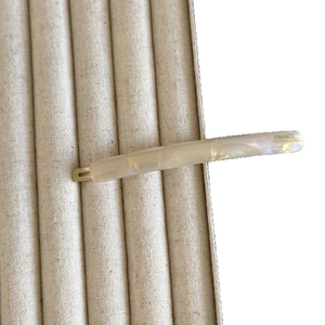 Beige marble pattern acetate hair clip with golden metal clip and handmade engraving