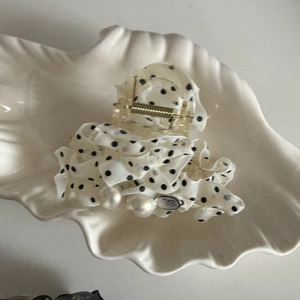 Polka dot chiffon bow hair claw clip with pearl accents and resin teeth for women