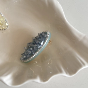 Barrette à cheveux ovale en cristal bleu élégante avec bordure en perles argent