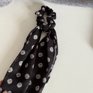 Polka dot chiffon hair scrunchie with long ribbon streamers for elegant ponytails