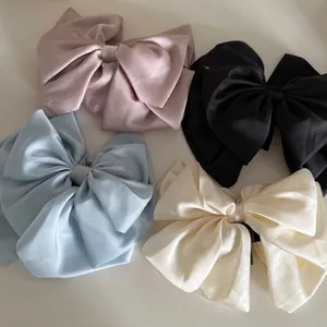 Pinces à cheveux élégantes en satin violet, noir, bleu et crème pour coiffures femmes