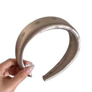 French style satin polka dot padded headband in champagne gold with silk texture finish
