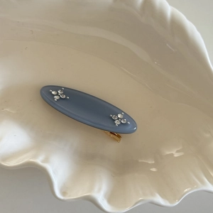 Französische Haarspange aus blauem Acetat mit ovaler Form und Stern-Strasssteinen