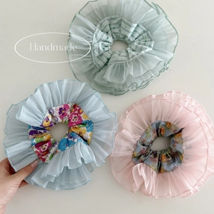 Three-piece handmade organza scrunchie set with mint green stripes and floral prints