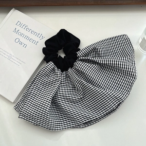 Classic black and white plaid oversized scrunchie hair tie with fan-shaped ruffles