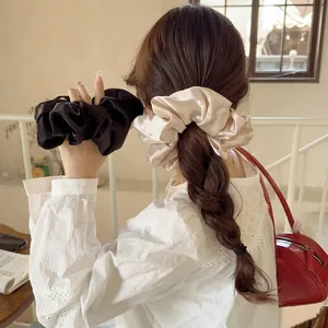 French style satin silk scrunchies in black and champagne for elegant hair styling