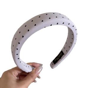Puffy purple headband with heart pattern polka dots and soft fabric sponge padded design
