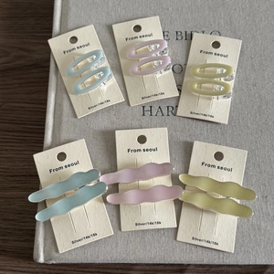 Korean style cream macaroon metal hair clips set in oval and wavy shapes for women