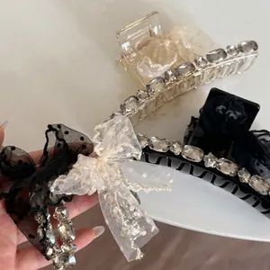 Pinces à cheveux élégantes avec nœuds en dentelle à pois et strass scintillants