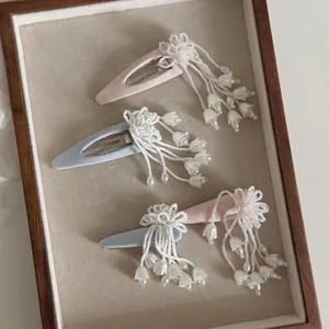 Elegantes Maiglöckchen Perlen Blume Quaste Haarklammer Legierung Stoff Schleife Künstliche Perle Strass Haarschmuck Für Damen