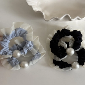 Elegant blue and black mesh scrunchies with white organza trim and large pearl bead