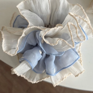 Double-layered embroidered polka dot hair scrunchie in blue and cream tulle with lace edges