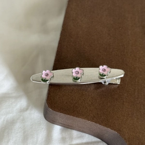 Silver vintage floral hair clip with pink enamel flowers and rhinestone details