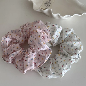 Set of two floral scrunchies in pink and white with delicate blossom patterns