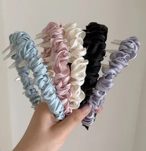 Set di 5 cerchietti plissettati in raso con denti antiscivolo in colori pastello