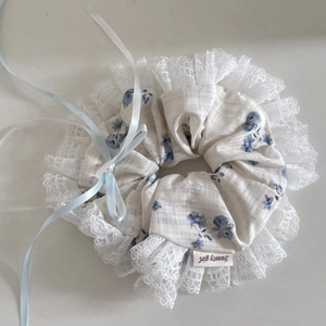 Floral scrunchie with blue prints and lace trim for sweet women's hairstyles