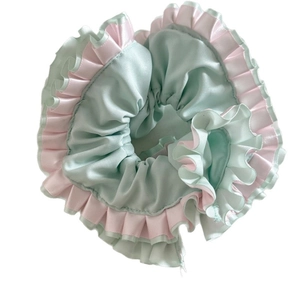 Pink and mint green contrasting ruffle scrunchie for hair buns and low pony tails