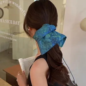 Vintage floral silk ponytail scarf tie with elegant blue botanical print for women