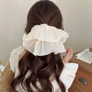 Oversized cream mesh scrunchie with elegant pearl accents on a double-layer fabric