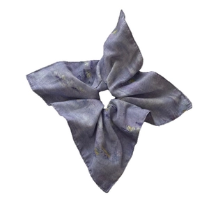 Floral lavender scrunchie hair tie with artistic yellow print and petal design