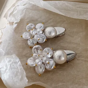 Exquisite pearl flower hair clips with silver polished metal base for elegant women styling