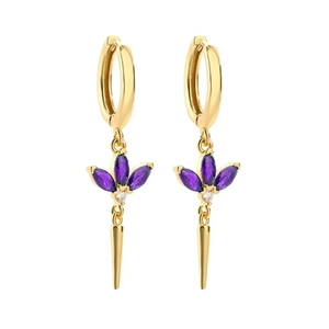 Close-up of gold clover earrings with purple marquise crystals and cone pendant charms