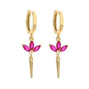 Detailed macro view of S925 huggie earrings with pink marquise stones and gold spikes