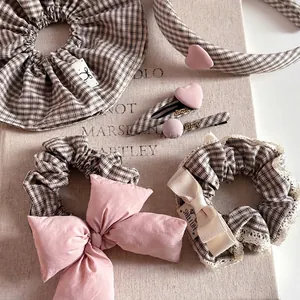 Pink heart and plaid bow hair accessory set with scrunchies and headband for women