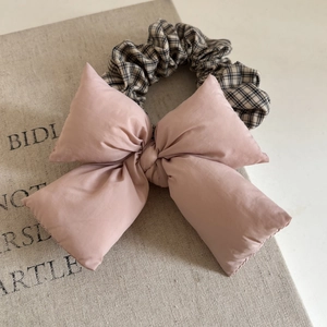 Pink heart bow hair scrunchie with classic black and white checkered elastic band