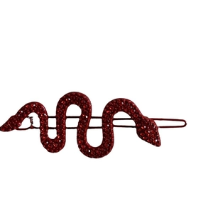 Sparkling red snake hair clip with full rhinestones in a sleek S-shaped metal design