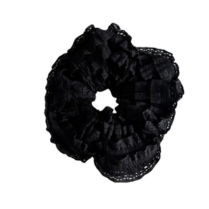 Elegant black lace scrunchie with layered ruffle design for stylish hair styling accessories