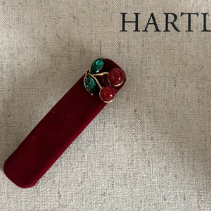 Vintage red velvet hair clip featuring sweet cherry design with green crystal leaves