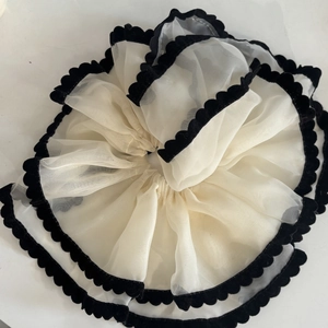 White organza scrunchie with black velvet scalloped edges for a ballet style look
