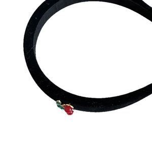 Retro red cherry ornaments on a black velvet wide headband for elegant hair styling