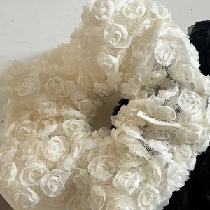 Elegant black and cream lace flower scrunchie with layered mesh rose detailing