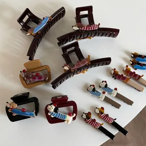 Schattige haarclips set met dachshund hondenmotief in bruin en zwart voor dames